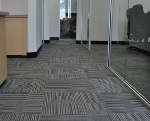 Corridor with carpet tile flooring